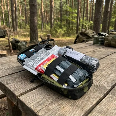 Військова аптечка Tactical aid kit (з турнікетом CAT 7)