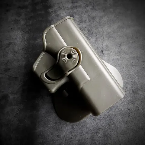 Кобура поясна пластикова під Glock 19 олива